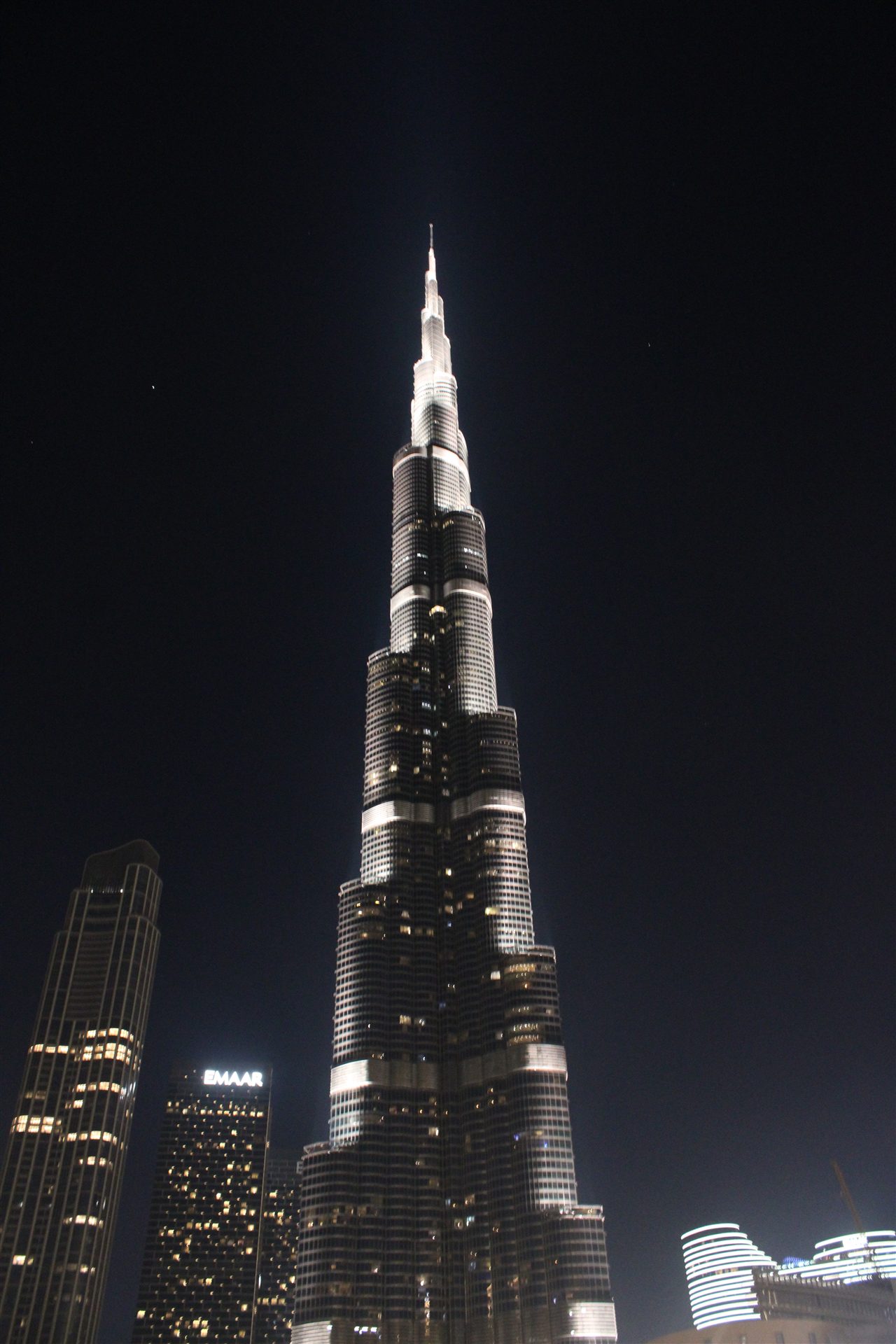 Burj Khalifa illuminated against the night sky