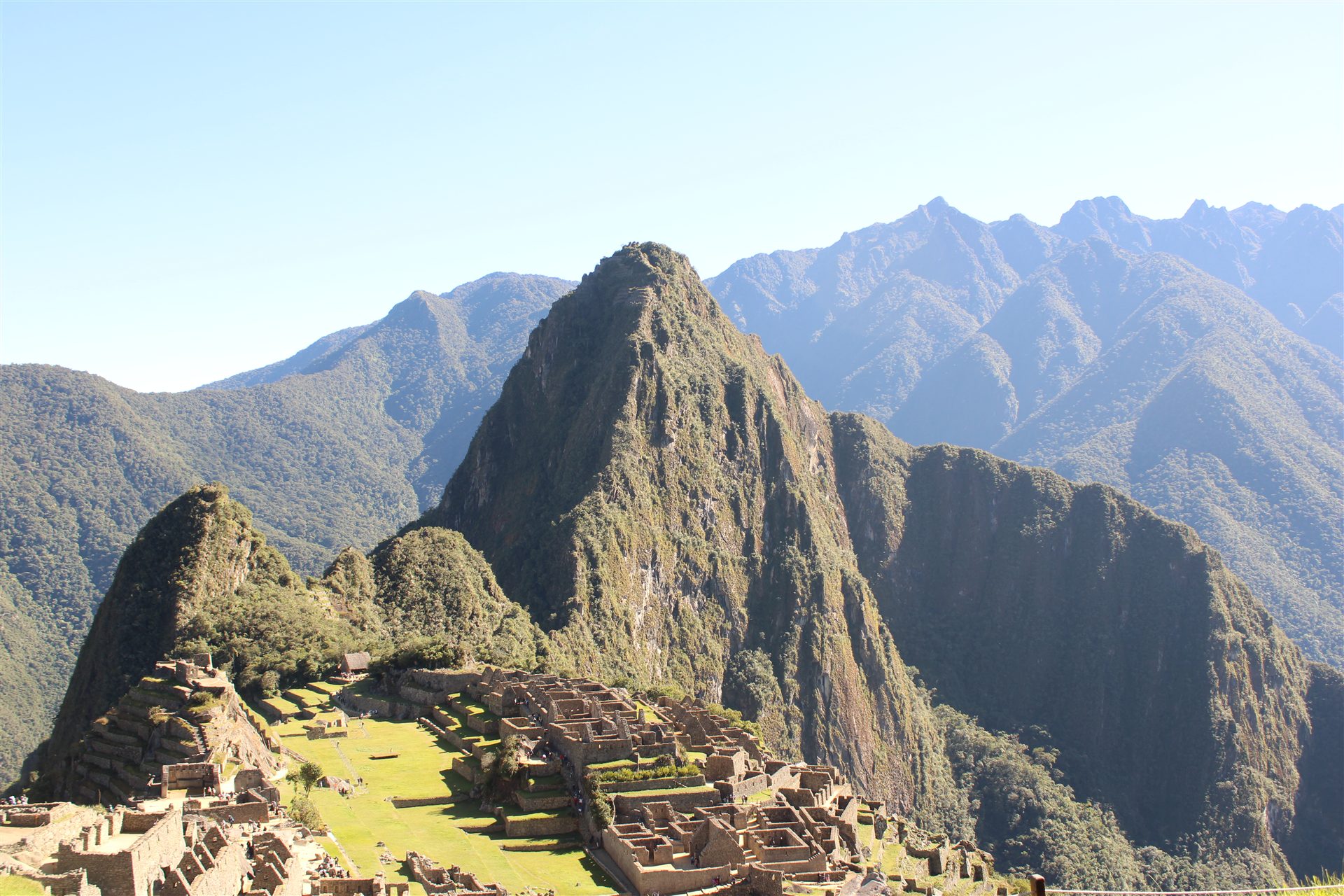 Wide view of Machu Picchu and surrounding mountains